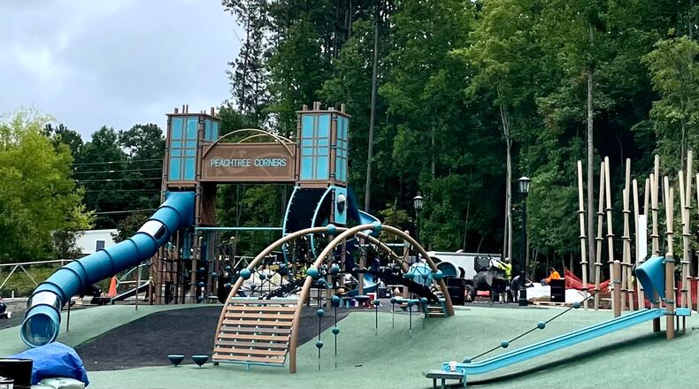 The custom Peachtree Corners Tower mimics the PTC pedestrian bridge that crosses Peachtree Parkway. (Photo by Karen Huppertz for the AJC)