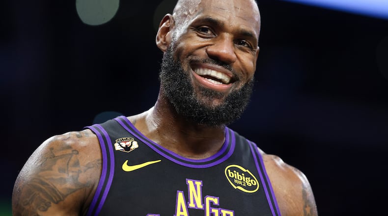 FILE - Los Angeles Lakers forward LeBron James reacts during the first half of an NBA basketball game against the Phoenix Suns, Friday, April 10, 2026, in Los Angeles. (AP Photo/Jessie Alcheh, File)