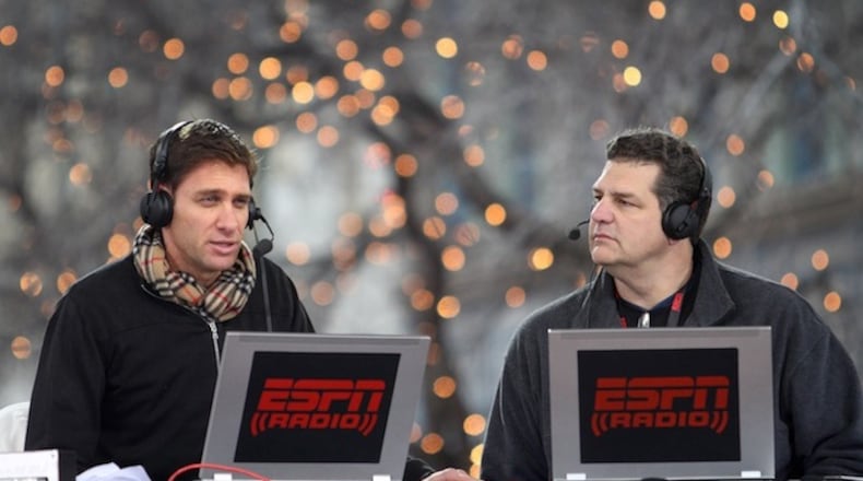 ESPN Radio's Mike Greenberg, left, and Mike Golic broadcast Mike and Mike In The Morning as they begin Super Bowl broadcasting on January 31, 2011, from their studio set on Main Street in downtown Fort Worth, Texas. (Paul Moseley/Fort Worth Star-Telegram/TNS)