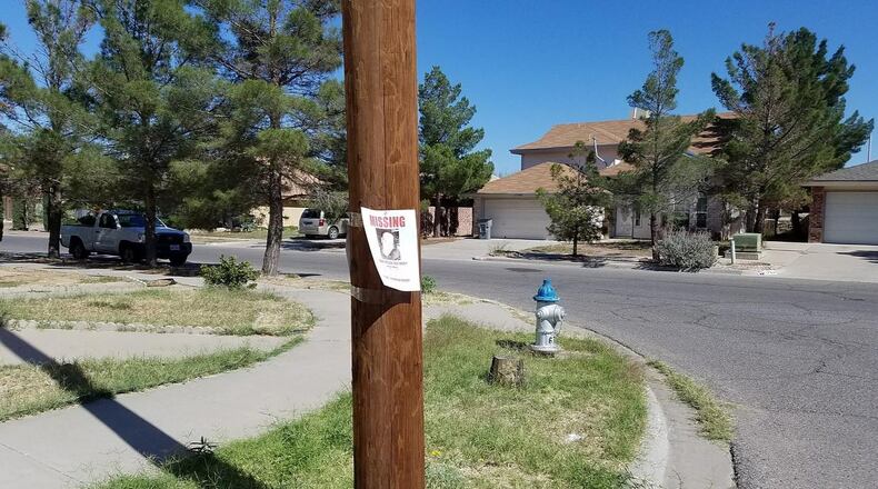 A missing person flyer is tacked to a pole in a neighborhood. The family of Sydney Loffe is distributing flyers as part of an effort to find the missing 24-year-old Lincoln, Neb., woman, who was last seen on Wed., Nov. 15.