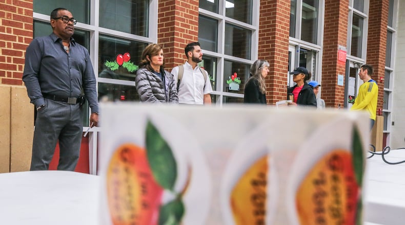 Voters headed to the polls at Henry W. Grady High School in Atlanta on Tuesday. The region’s voters decided a slew of city council, county commission and mayoral races. JOHN SPINK/JSPINK@AJC.COM