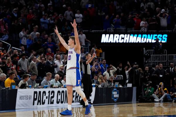 Florida forward Thomas Haugh (10) celebrates during the second half in the Elite Eight of the NCAA college basketball tournament against Texas Tech, Saturday, March 29, 2025, in San Francisco. (AP Photo/Godofredo A. Vásquez)