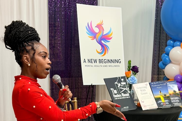 Jamie Kirk, founder of A New Beginning Mental Health & Wellness, speaks to the crowd at a launch party on Tuesday, Nov. 18, 2025, at the Little Five Points Community Center in Atlanta. (Courtesy of Jamie Kirk)
