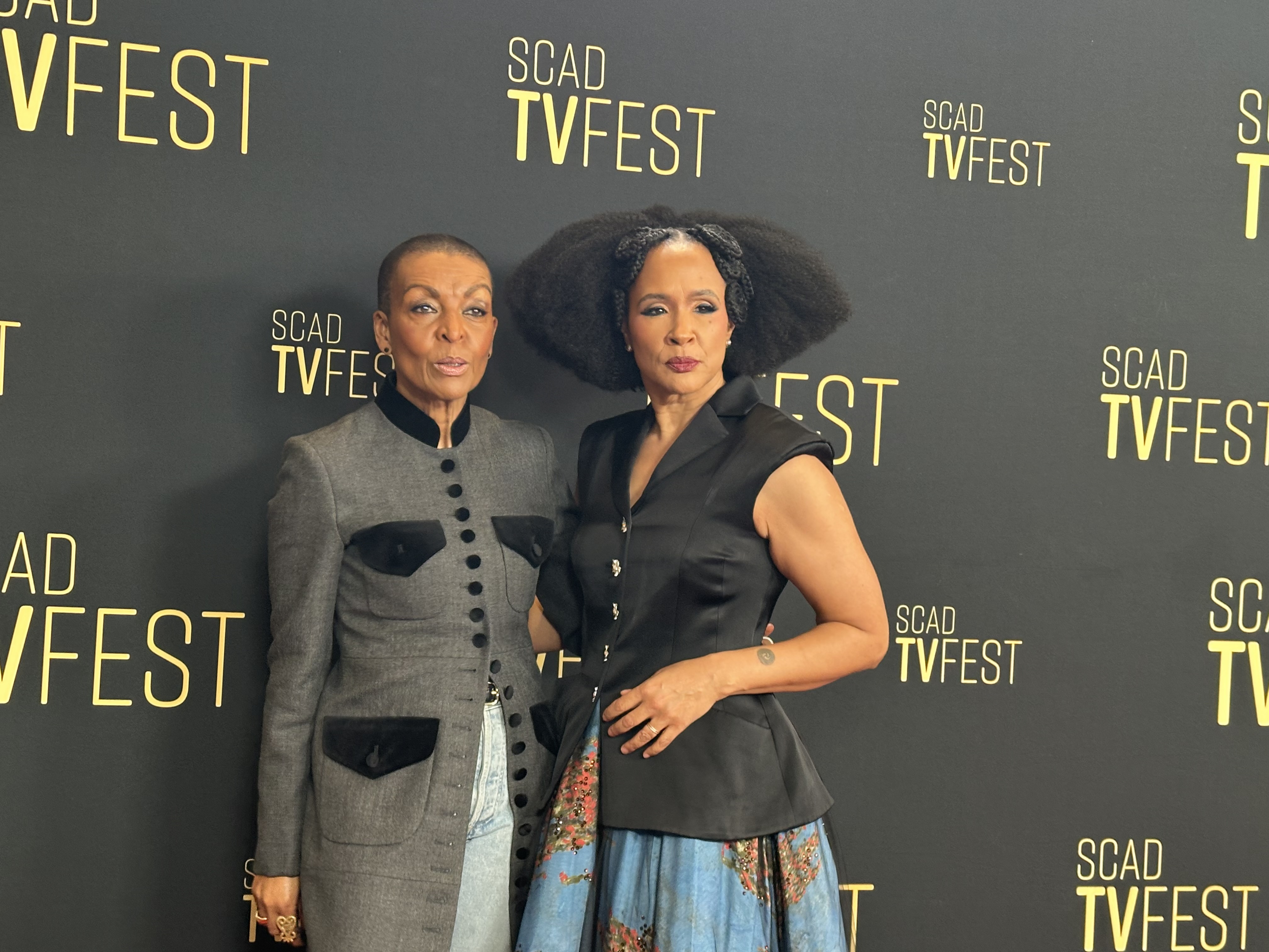 "Bridgerton" actors Adjoa Andoh (left) who plays Lady Danbury and Golda Rosheuvel who plays Queen Charlotte work the red carpet for 2026 SCAD TVfest, Feb. 4, 2026 at the Four Seasons Hotel in Midtown Atlanta.(Rodney Ho/AJC)