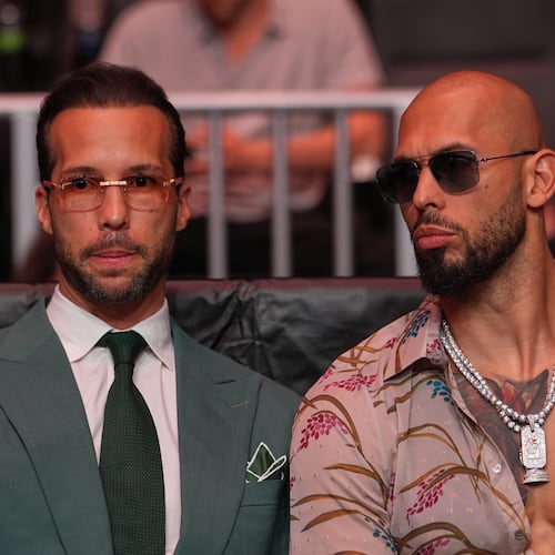 FILE - Andrew Tate, right, and his brother Tristan arrive at an event, April 11, 2026, in Miami. (AP Photo/Julia Demaree Nikhinson, Pool, File)