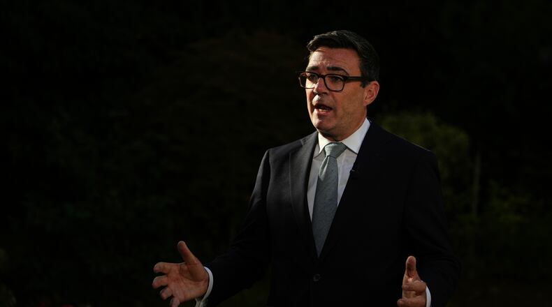 Britain's Prime Minister Andy Burnham speaks to the media after chairing a COBR meeting at Downing Street on the UK's ongoing response to extreme heat, wildfires and drought in London, Wednesday, Aug. 12, 2026.(AP Photo/Kin Cheung, Pool)