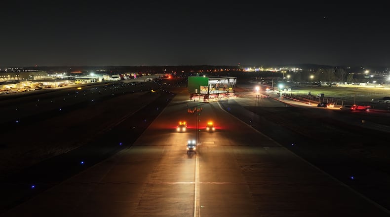 The final module in the North side of Concourse D's widening is rolled into place in the early hours Wednesday, Feb. 5, 2025.