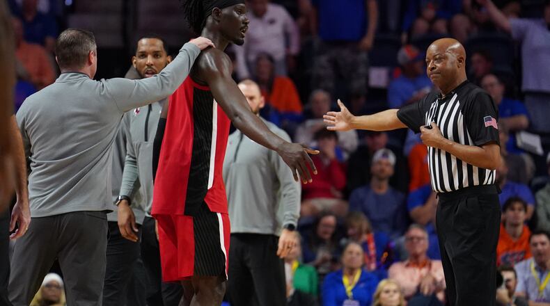 Georgia center Somto Cyril is ejected from the game after elbowing Florida’s Rueben Chinyelu in the face on Tuesday, Jan. 6, 2026, in Gainesville, Fla. (Morgan Hurd/AP)