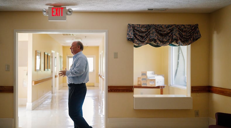 Rollins stands in Gray Health and Rehabilitation, a nursing home that was replaced by a newer facility that serves central Georgia seniors. (Melissa Golden/Redux, special to ProPublica)