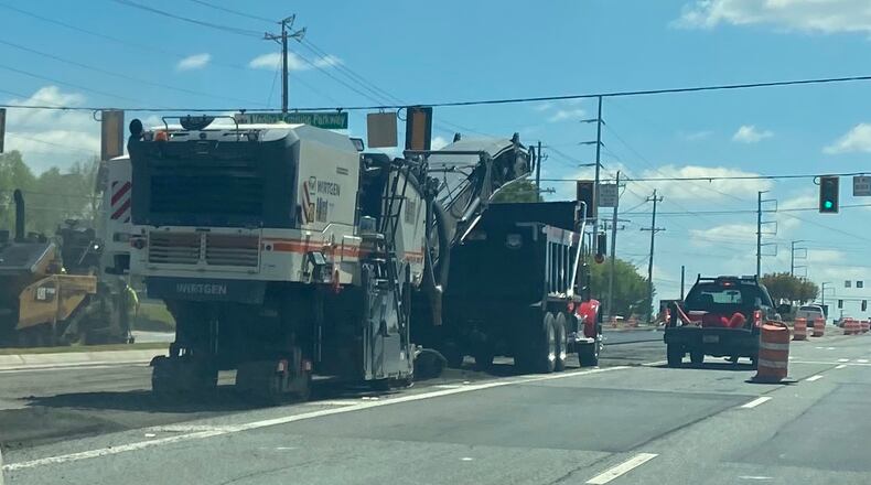 Phase 1 construction is underway at the intersection of Medlock Bridge Road and State Bridge Road in Johns Creek. (Karen Huppertz for the AJC)