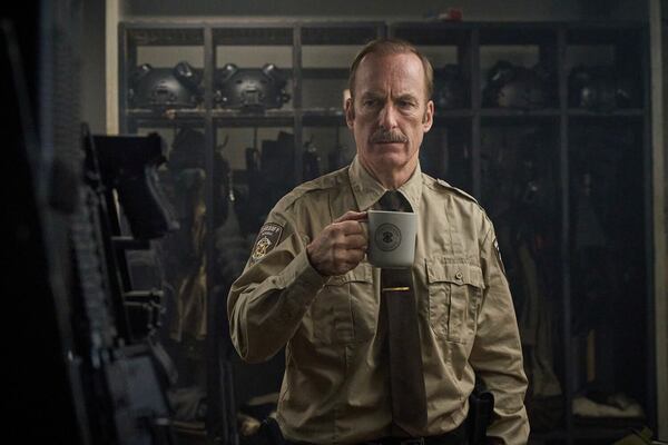 Bob Odenkirk plays Ulysses, a forlorn man covering for a longtime sheriff who died in a mysterious ice fishing accident, in "Normal," which premiered in theaters Friday. (Magnolia Pictures via AP)