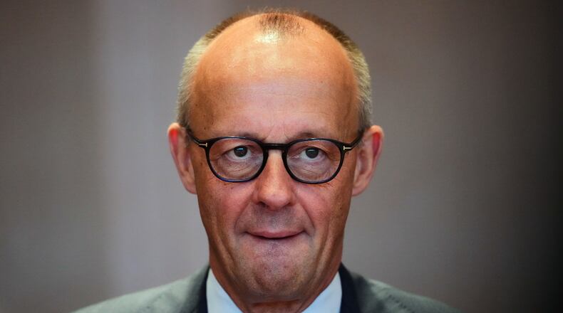 German Chancellor Friedrich Merz arrives for the Cabinet meeting at the Chancellery in Berlin, Germany, Wednesday, Sept. 16, 2026. (AP Photo/Markus Schreiber)