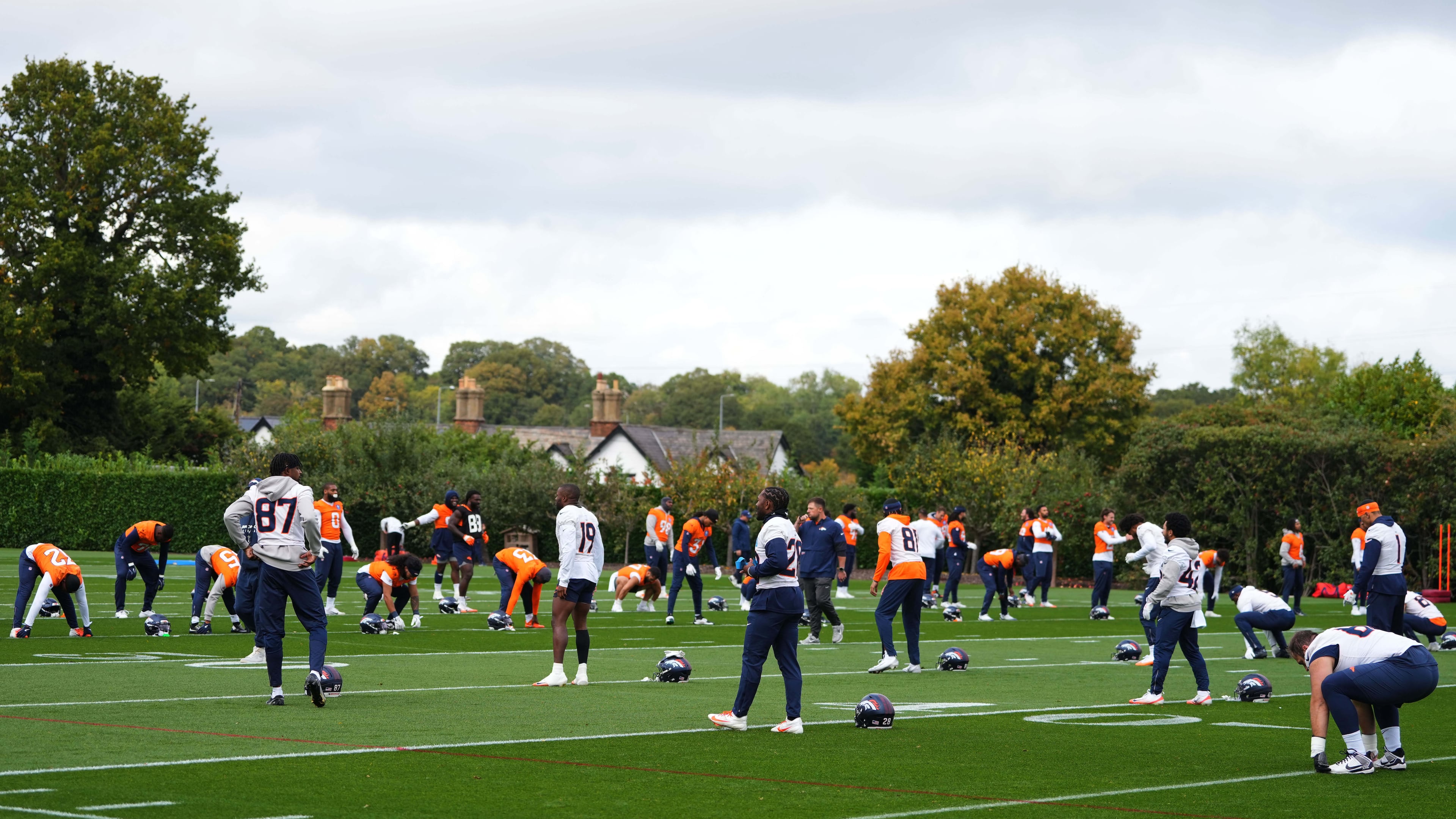 Denver Broncos take part in a NFL training session at Tottenham Hotspur training ground in London, Wednesday, Oct. 8, 2025. (AP Photo/Kirsty Wigglesworth)