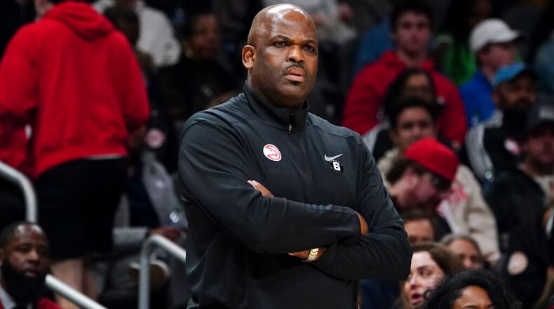 Hawks coach Nate McMillan has made some questionable decisions this season. (AP Photo/John Bazemore)