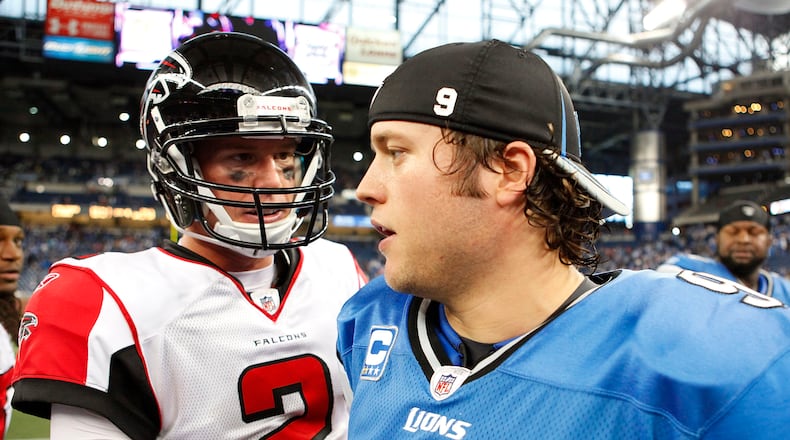 Falcons QB Matt Ryan, Lions QB Matthew Stafford meet on field following 2017 game in Detroit.  (Photo by Leon Halip/Getty Images)