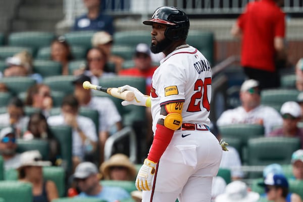 Braves designated hitter Marcell Ozuna reacts after striking out against the Phillies on Sunday.