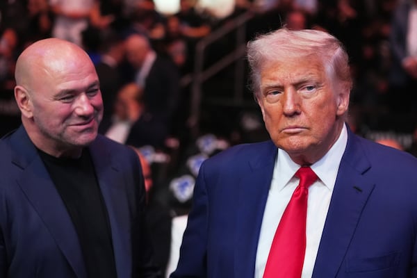 President Donald Trump attends the UFC-316 mixed martial arts event, at the Prudential Center, Saturday, June 7, 2025, in Newark, N.J., as UFC's Dana White, looks on. (AP Photo/Frank Franklin II)