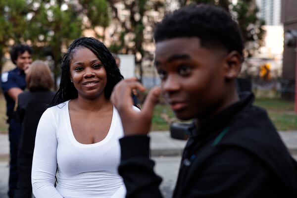Jasmine Thomas said she was “freaking out” and felt powerless to be there for her son and niece, only able to speak to them through the phone. (Natrice Miller/AJC)