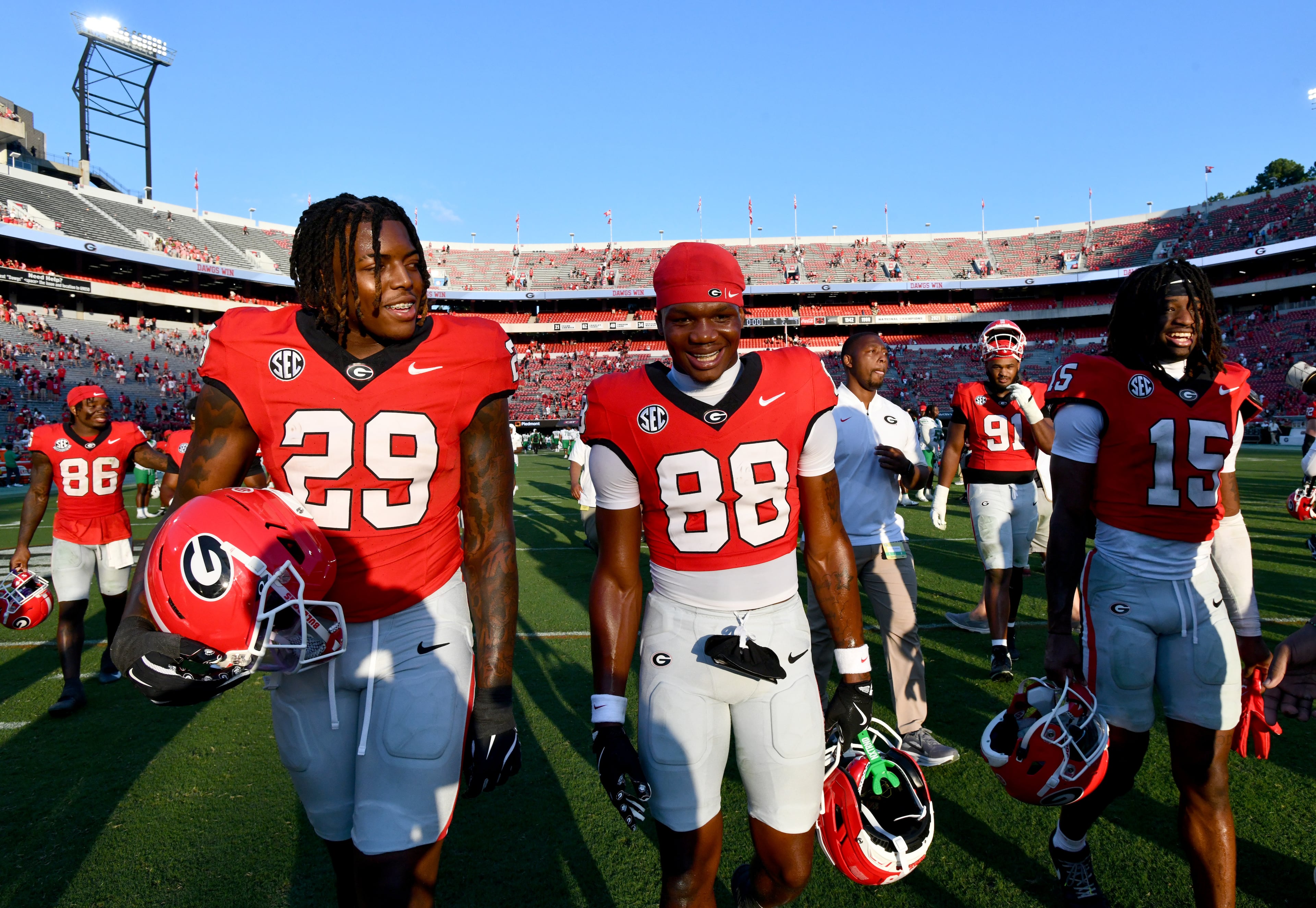 Georgia players leave the football field after Georgia beat Marshall during an NCAA football game at Sanford Stadium, Saturday, August 30, 2025, in Athens. Georgia won 45-7 overMarshall. (Hyosub Shin / AJC)