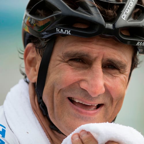 FILE - Alex Zanardi, smiles after winning the silver medal in the men's road race H5, during the 2016 Paralympics Games, in Rio de Janeiro, Brazil, Sept. 15, 2016, (AP Photo/Mauro Pimentel, File)