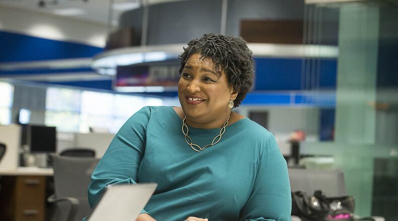 A day after bowing out of the race for governor, former Georgia Gubernatorial Democratic candidate Stacey Abrams speaks to Atlanta Journal-Constitution reporters at the WSB-TV headquarters in Atlanta, Saturday, Nov.17, 2018.(ALYSSA POINTER/ALYSSA.POINTER@AJC.COM)
