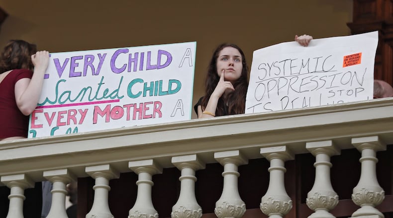 Supporters and opponents of Georgia’s anti-abortion law demonstrate in the Georgia Capitol. Bob Andres / bandres@ajc.com