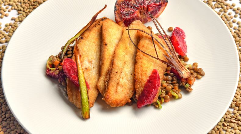 Lyla Lila’s Crispy Flounder with Lentils, Leeks and Blood Orange pairs green lentils with citrus. Styling by chef Craig Richards / Chris Hunt for the AJC
