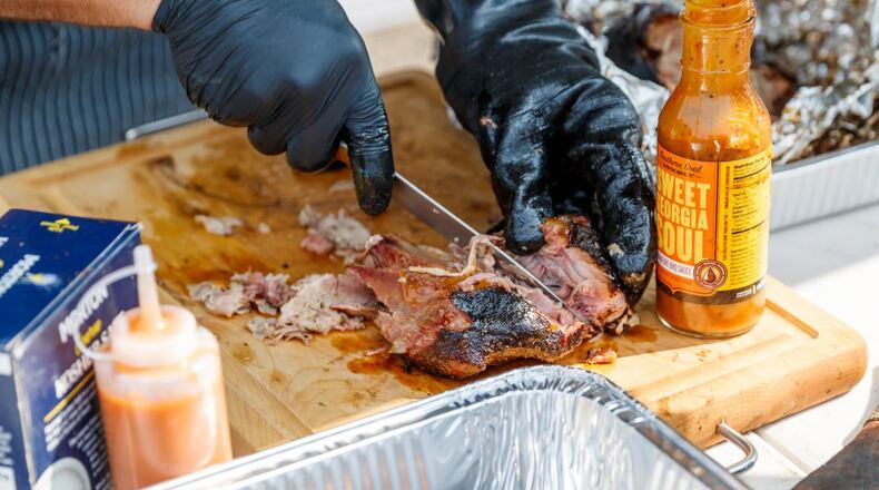 The 20th annual version of Pigs & Peaches BBQ Festival will be held by Kennesaw Parks & Rec on Aug. 20 and 21. (Courtesy of Kennesaw)