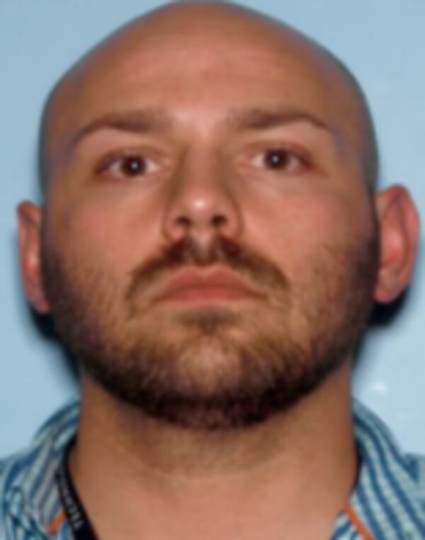 Authorities are looking for Benjamin Fancher after he allegedly attacked a woman in Atlanta.