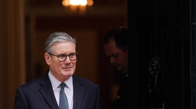 Britain's Prime Minister Keir Starmer leaves 10 Downing Street to welcome President Prabowo Subianto of Indonesia and after Britain's government has approved a massive new Chinese Embassy in central London in London, Tuesday, Jan. 20, 2026.(AP Photo/Alberto Pezzali)