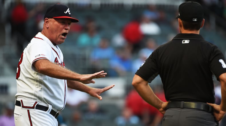 Braves manager Brian Snitker argues with the umpire Aug. 20, 2019, against the Miami Marlins at SunTrust Park in Atlanta. Snitker was tossed from the game.