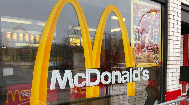 A McDonald's restaurant employee was charged by police when she assaulted her manager, according to a police report.