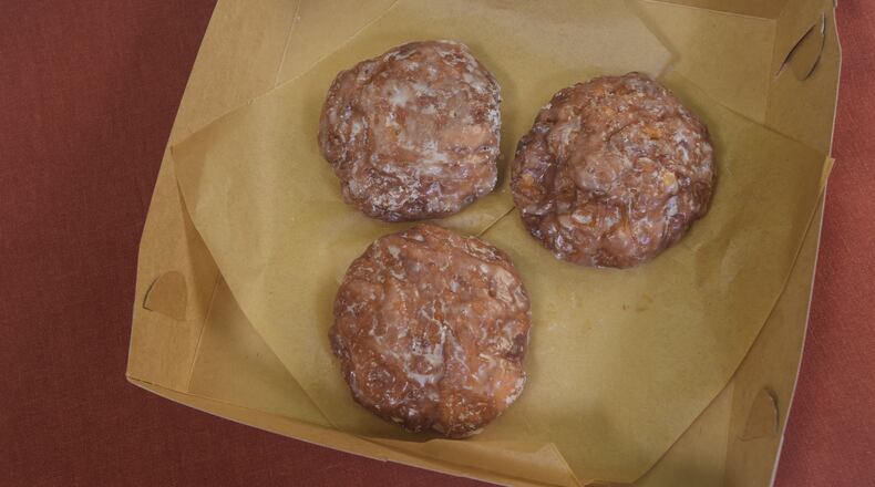 BREAKFAST: Apple fritters from Tip Top Donuts in Marietta. KENT D. JOHNSON/KDJOHNSON@AJC.COM