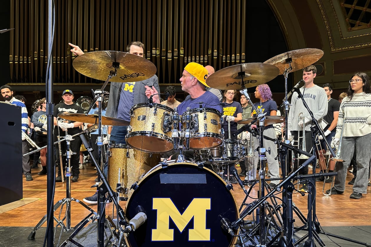 Red Hot Chili Peppers drummer Chad Smith performs with the Michigan Marching Band in Hill Auditorium on the campus of the University of Michigan Sunday, Nov. 2, 2025, in Ann Arbor, Mich. (AP Photo/Mike Householder)