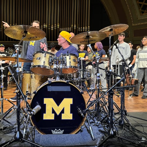 Red Hot Chili Peppers drummer Chad Smith performs with the Michigan Marching Band in Hill Auditorium on the campus of the University of Michigan Sunday, Nov. 2, 2025, in Ann Arbor, Mich. (AP Photo/Mike Householder)