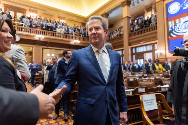 Gov. Brian Kemp enters the House of Representatives for the State of the State address at the Capitol in Atlanta on Thursday, January 11, 2024. (Arvin Temkar/arvin.temkar@ajc.com)
