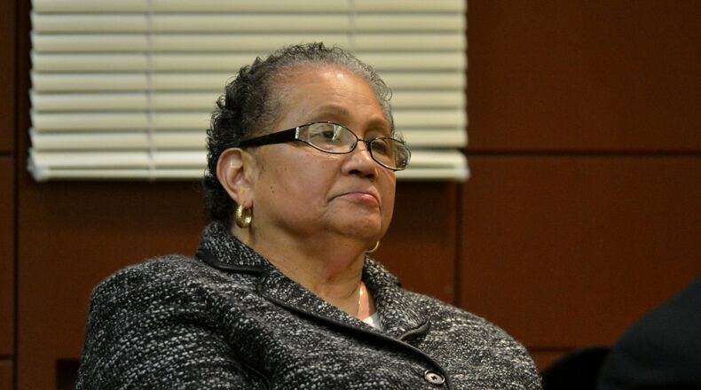 Former APS superintendent Beverly Hall listens as pleas are entered in court Monday, January 6, 2014. Judge Jerry Baxter ordered all the remaining 23 defendants in the Atlanta Public Schools test-cheating case to appear in court Jan. 6 and declare whether they will enter negotiated pleas or proceed toward trial. Lawyers involved in the case say six of the remaining defendants have decided to enter guilty pleas. If that comes to pass, it means the case will be effectively cut in half since 35 former educators were indicted earlier in 2013. (One of the 35 is now deceased.) KENT D. JOHNSON / KDJOHNSON@AJC.COM