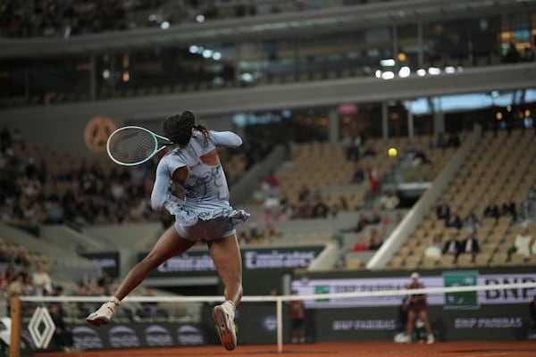 Coco Gauff of the U.S. plays a shot against Madison Keys of the U.S. during their quarterfinal match of the French Tennis Open at the Roland-Garros stadium in Paris, Wednesday, June 4, 2025. (AP Photo/Christophe Ena)