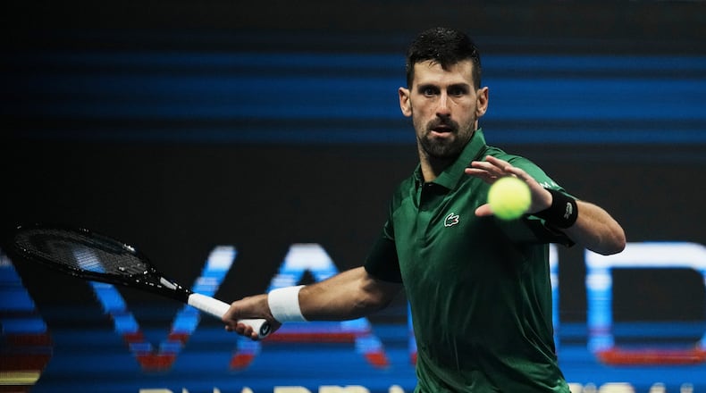 FILE - Novak Djokovic, of Serbia, plays a shot against Yannick Hanfmann, of Germany, during the ATP250 tournament semifinal tennis match in Athens, Greece, Nov. 7, 2025. (AP Photo/Thanassis Stavrakis, File)