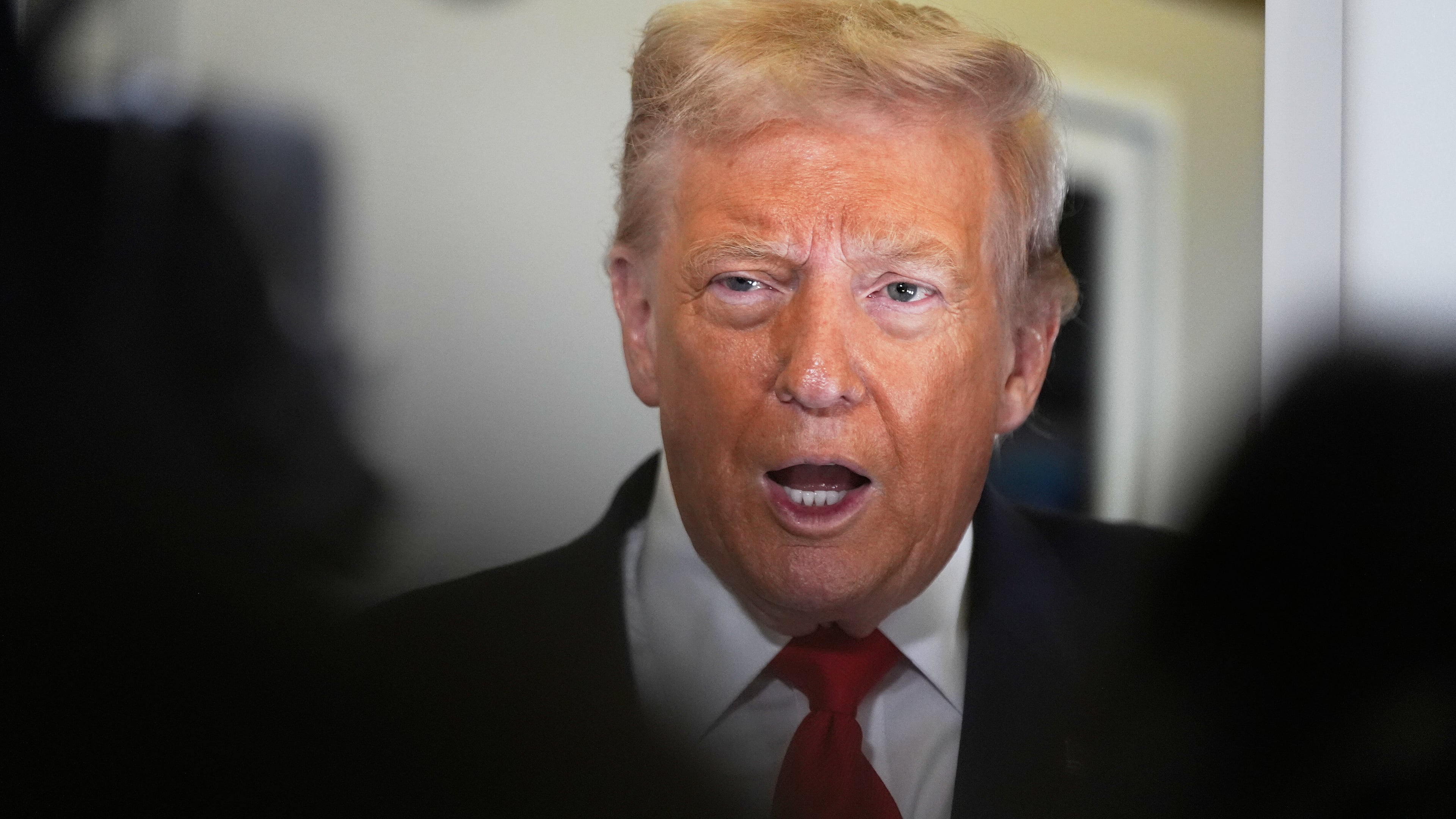 President Donald Trump speaks to the media after boarding Air Force One at Joint Base Andrews, Md., Friday, Oct. 31, 2025, enroute to Florida. AP Photo/Manuel Balce Ceneta)