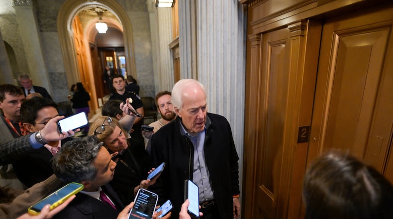 Sen. John Cornyn, R-Texas, talks with reporters as he leaves the Senate chamber during a Senate war powers vote on Iran on Capitol Hill, Wednesday, March 4, 2026, in Washington. (AP Photo/Rod Lamkey, Jr.)