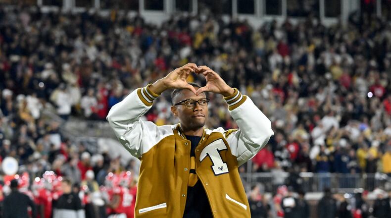 Georgia Tech men's tennis star Chris Eubanks is introduced during the first half of an NCAA college football game at Georgia Tech's Bobby Dodd Stadium, Saturday, November 25, 2023, in Atlanta. Georgia won 31-23 over Georgia Tech. (Hyosub Shin / Hyosub.Shin@ajc.com)