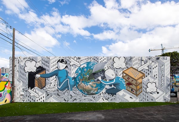 Works by more than 100 international artists, such as this mural by Millo, decorate Wynwood Walls in Miami. (Courtesy of Wynwood Walls)