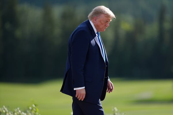 President Donald Trump walks away following the family photograph during the G7 Summit in Kananaskis, Alberta, Monday, June 16, 2025. (Darryl Dyck/The Canadian Press via AP)