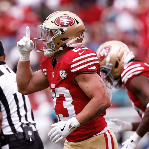 San Francisco 49ers running back Christian McCaffrey celebrates after scoring against the Miami Dolphins during the first half of an NFL football game in Santa Clara, Calif., Sunday, Sept. 20, 2026. (AP Photo/Kelley L. Cox)