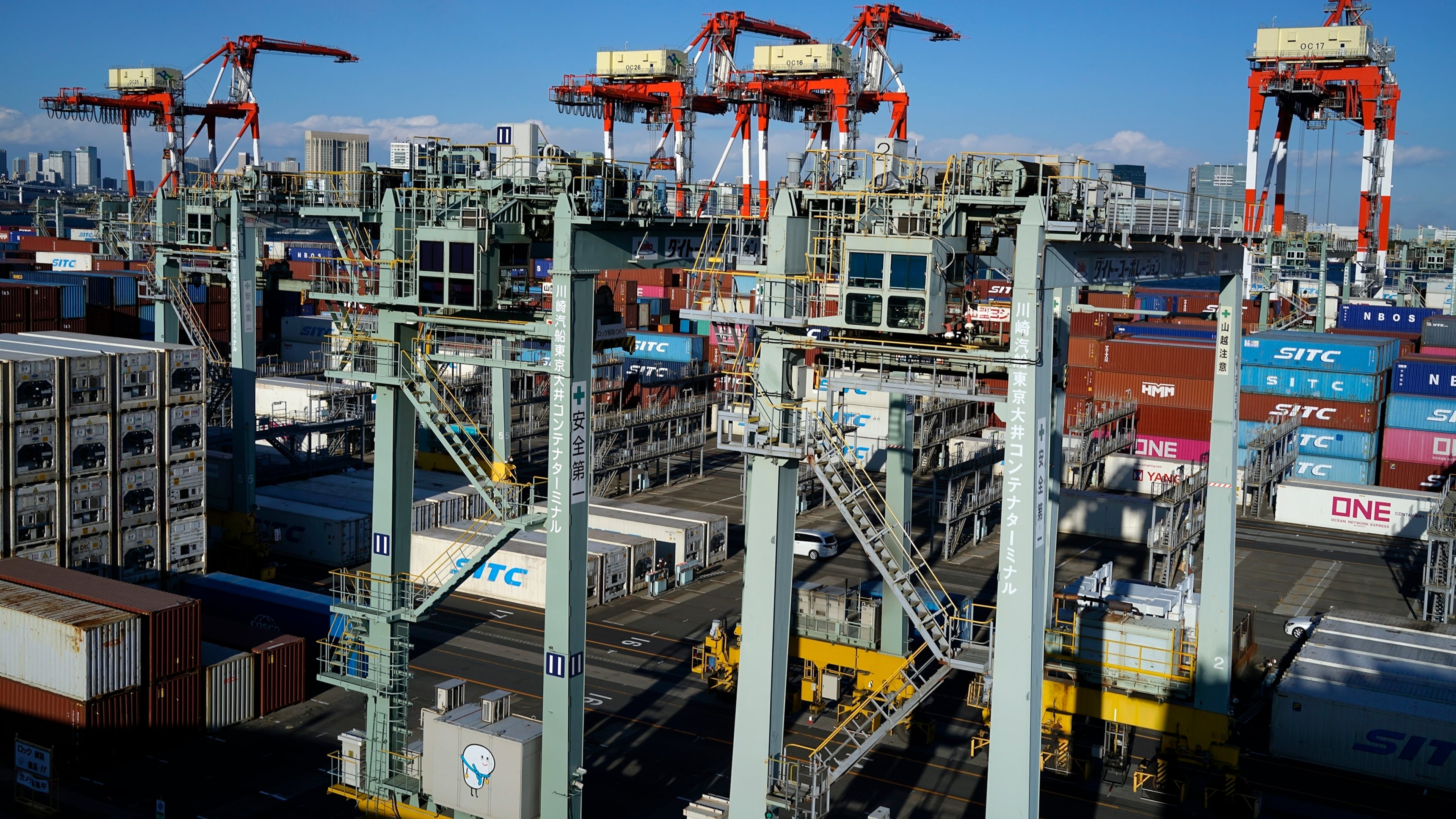 Tokyo Container Terminal is seen in Tokyo on Wednesday Feb. 19, 2025. (AP Photo/Eugene Hoshiko)