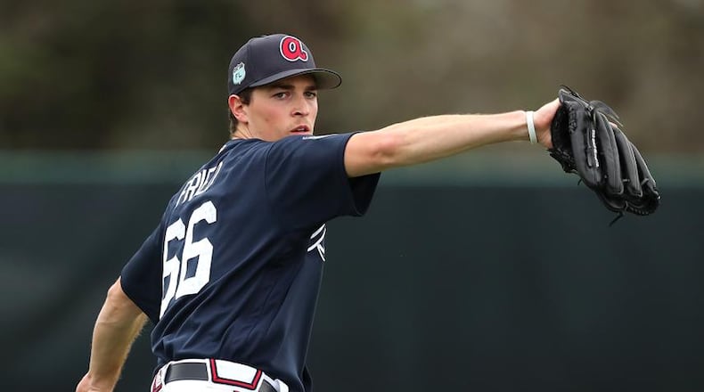 Braves pitcher Max Fried throws to loosen up his arm during the first full-squad workout on Feb. 18, 2017, at the ESPN Wide World of Sports in Lake Buena Vista. (Curtis Compton/ccompton@ajc.com)