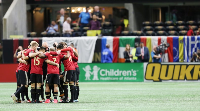 October 26, 2017. Atlanta United players gather in the field during the first round of the MLS playoff match at Mercedes-Benz stadium.