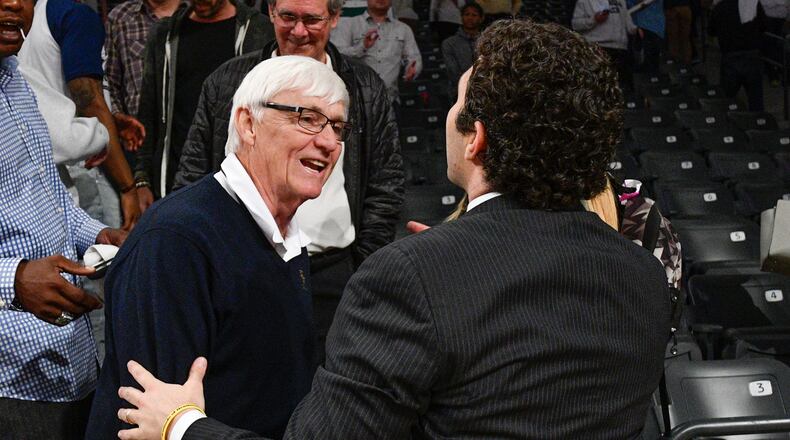 Former Georgia Tech head coach Bobby Cremins (left) congratulates Jackets coach Josh Pastner after Tech’s 71-65 upset win over Syracuse Sunday night at sold out McCamish Arena. (Photo by John Amis)