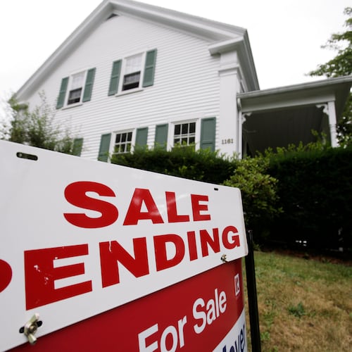 FILE - In this July 26, 2011 photo, a sale pending sign is posted outside a house in Bath, Maine. (AP Photo/Pat Wellenbach, File)